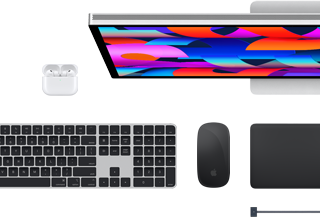 Mac accessories: AirPods, Studio Display, Magic Keyboard, Magic Mouse, Magic Trackpad, MagSafe charge cable in Midnight color