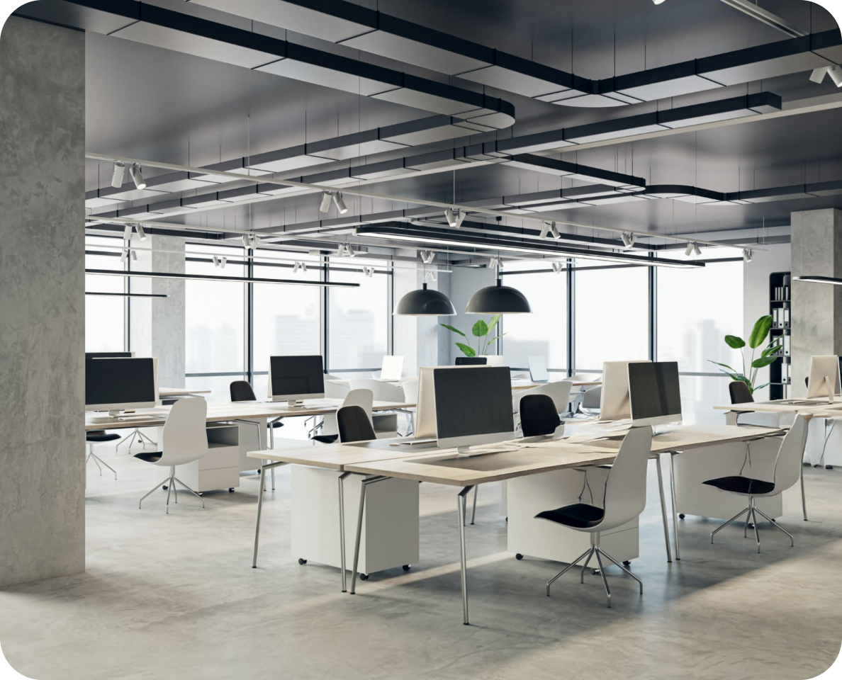 an office with a lot of desks and computers